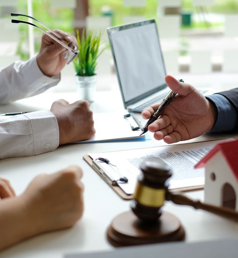 lawyer insurance broker consulting giving legal advice to couple customer about buying renting house.
